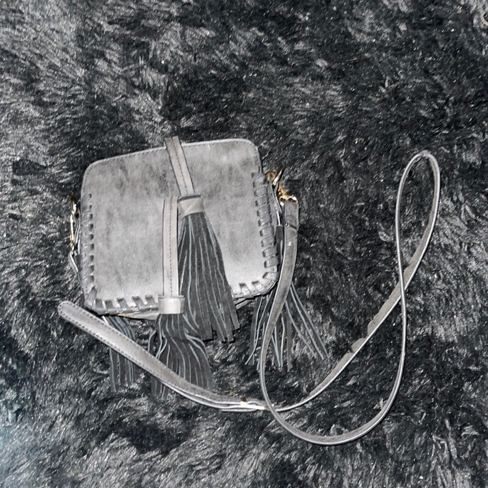 Super cute small crossbody/ clutch bag with adorable black tassels